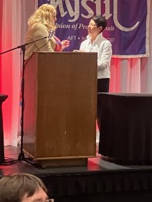 Sara Receiving Award